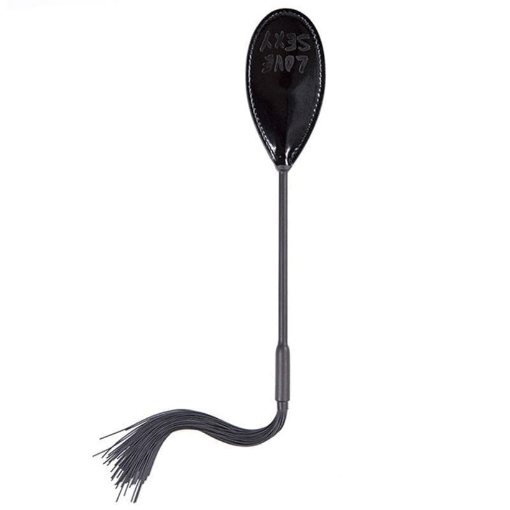 Featuring an image of Spank Me Crazy Paddle Whip showcasing the dual-end design with a crop and whip for versatile sensory explorations.
