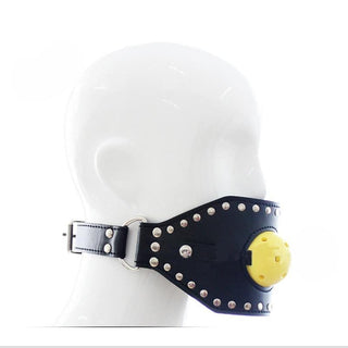 This is an image of Studded Leather Gag Ball in red color with adjustable strap for secure fit.