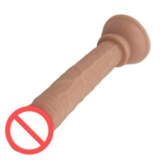 A functional image of the Small but Terrible Strong Sucker Thin Dildo being stuck onto a flat surface