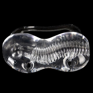 Take a look at an image of Delay Trainer Clear Pocket Pussy featuring three interconnected spheres filled with textures for escalating pleasure.