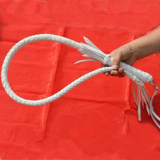 This is an image of Genuine Cowhide S&M Tassel Whip with three length options for versatile play and tactile delight.