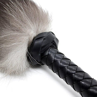 Feast your eyes on an image of PU Leather and Fur Flogger, combining strength, comfort, and luxury for intimate moments.