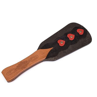 This is an image of BDSM Femdom Solid Pine Wood Paddle with red heart details for sensual discipline.