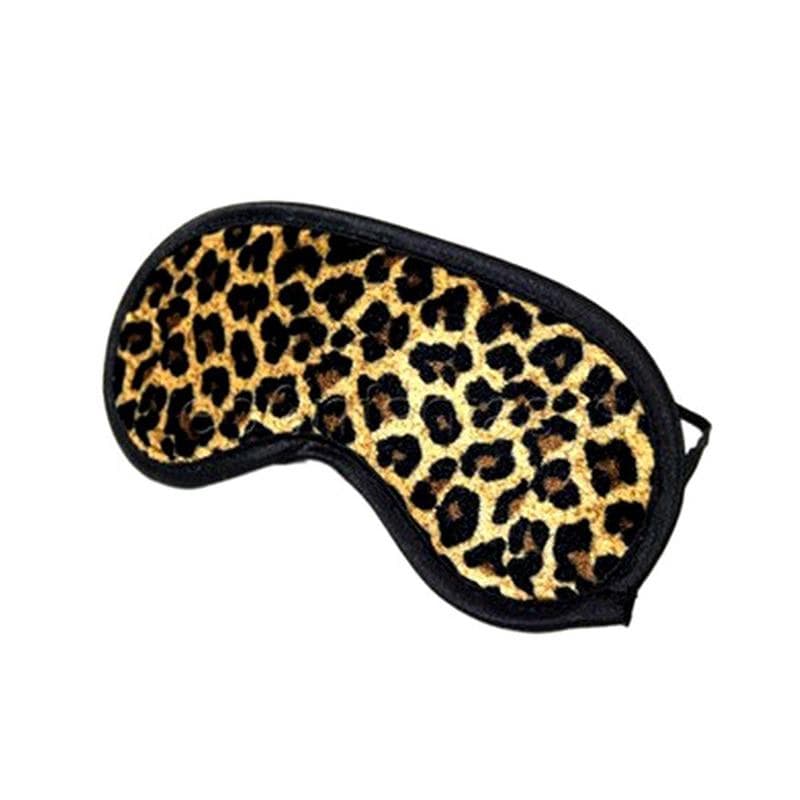 Leopard pattern blindfold enhancing sensory experiences for intimate moments.