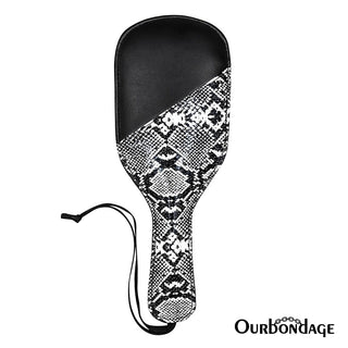 This is an image of Stylish Snakeskin-Inspired Ass Paddle with scaly underside and smooth leather top for unique tactile experience.