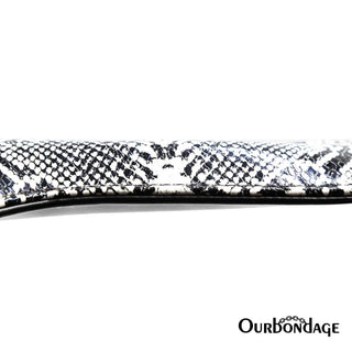 A detailed image of the Stylish Snakeskin-Inspired Ass Paddle, featuring a textured snakeskin pattern for added stimulation.