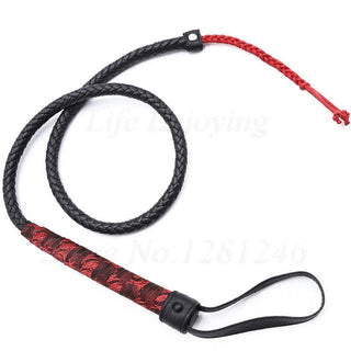 Observe an image of Total Obedience BDSM Leather Whip with red details for powerful sensations and dominance.