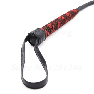Total Obedience BDSM Leather Whip, a versatile tool for power-play experiences, ready to guide you through untamed passion.