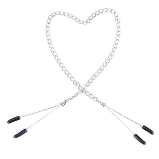 Feast your eyes on an image of Chained Tweezers Nipple Clamps for sensual exploration and pleasure.