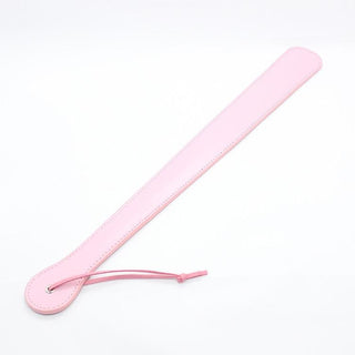 Check out an image of the ergonomic handle and wrist sling of the No Frills Slapper Leather Sex Paddle for comfortable handling.