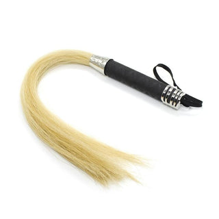 Take a look at an image of Genuine Horse Tail Fur Leather Whip, featuring a leather-wrapped metal handle and genuine horsetail fur tail for unique tactile sensations.