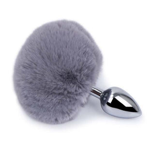 A vibrant Colorful Tail 4.5 Inches Long Anal Accessory Bunny with a round base for safe use and easy retrieval.