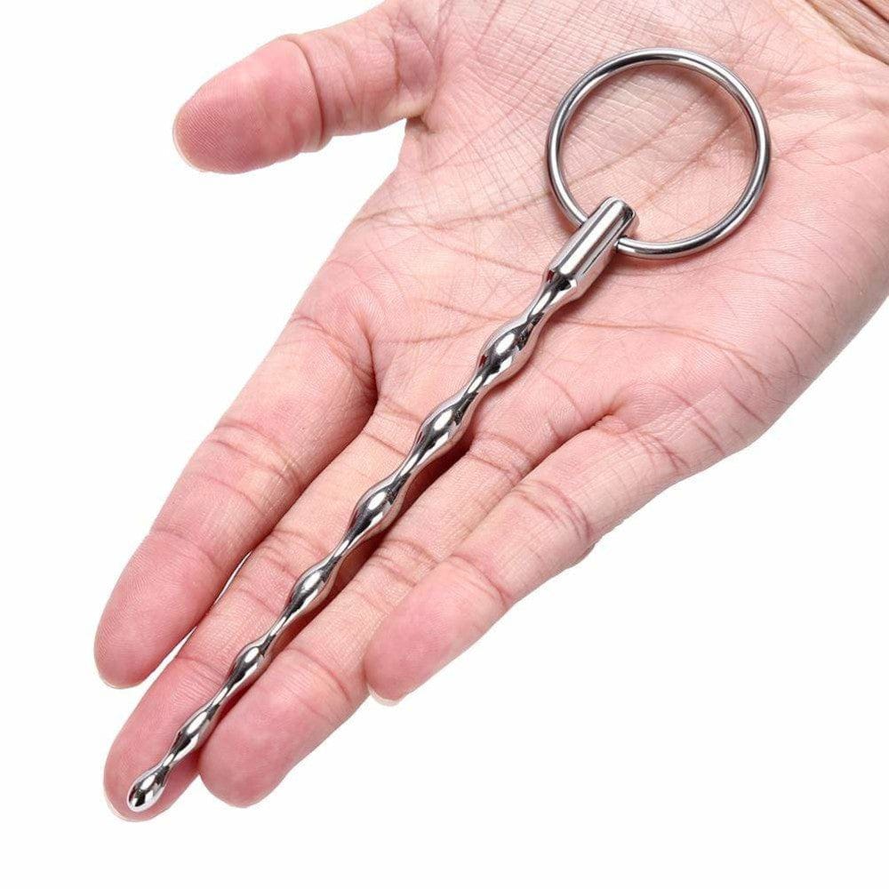 You are looking at an image of Princely Training Wand Urethral Beads in silver color with a prince wand design for intimate pleasure.