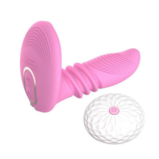Image of a ribbed silicone dildo vibrating and thrusting, designed for G-spot or prostate stimulation.
