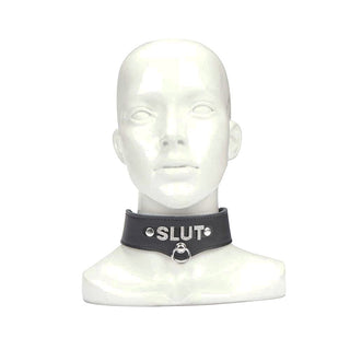 In the photograph, you can see an image of Jewelled Leather BDSM Collar featuring sparkling jewels inscribed with provocative terms like 