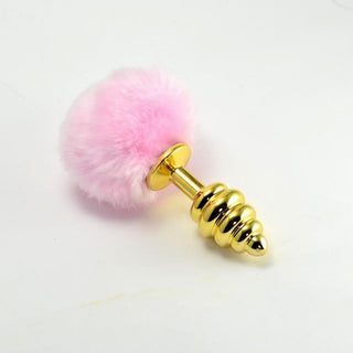 Pictured here is an image of Ribbed Golden Bunny Tail 5.7 Inches Long plug with ribbed texture and smooth tapered end.