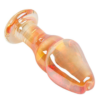 A picture of Cute Penis-Like Golden 5 Inch Glass Dildo with flared base for safe extended use.