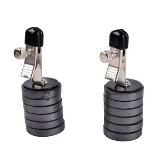 Observe an image of Magnetic Discs Weighted Nipple Clamps, a stainless steel and magnet toy designed for intimate playtime.