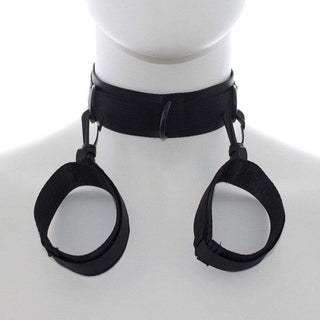 This is an image of a BDSM collar accessory designed for dominance and surrender play, featuring a D-ring for added control and versatility.