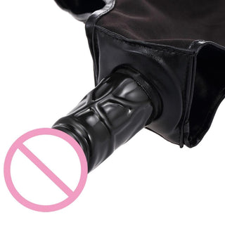 Intimate accessory featuring realistic 4-inch silicone dildo attached to black patent leather briefs.